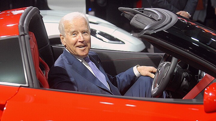 Joe Biden sits in a Corvette at the North American International Auto Show industry preview at Cobo Hall on January 16, 2014 in Detroit, Michigan