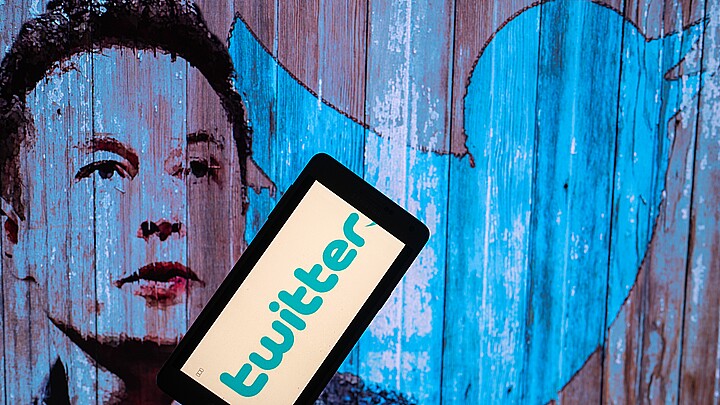 Elon Musk's Twitter account displayed on a mobile 