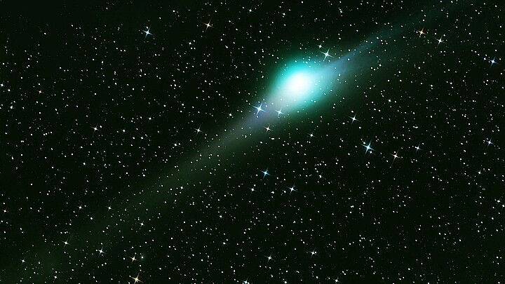 Green comet in dark space. Elements of this image furnished by NASA. 