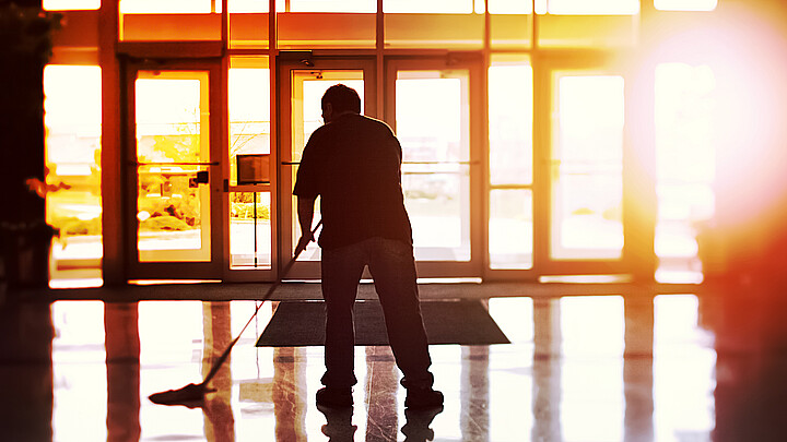 Janitor mopping floor