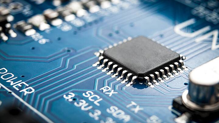 Integrated semiconductor microchip/microprocessor on blue circuit board