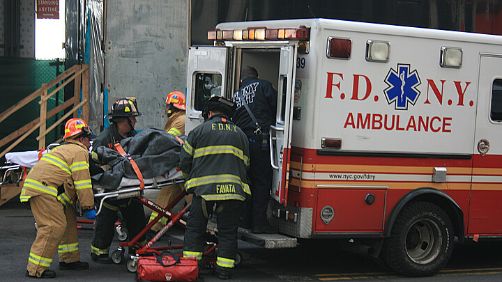 Individual loaded into ambulance in NYC