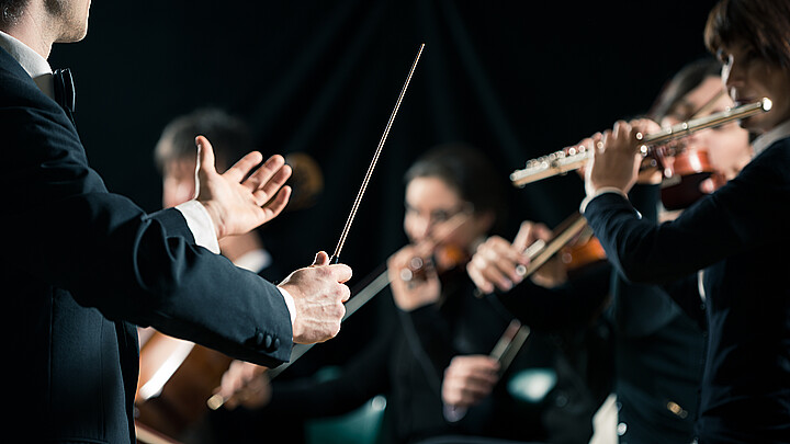 Stock image of orchestra conductor
