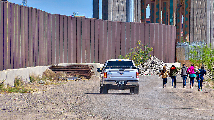 Migrants entering the U.S. from Mexico at the El Paso, Texas border