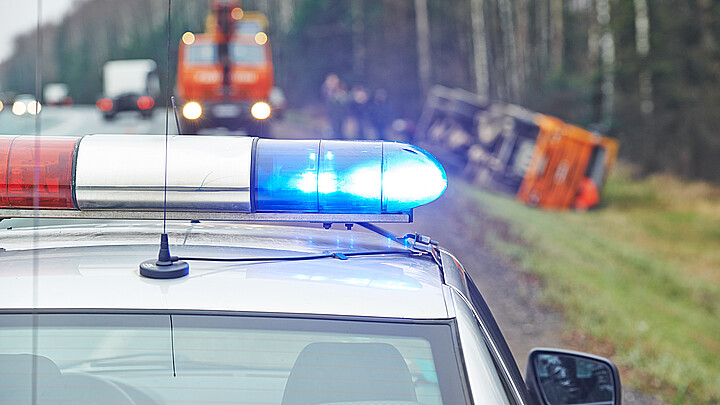 Highway patrol car conducting investigation on freeway