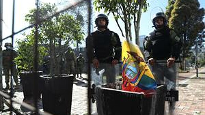 Ecuador military stands outside National Assembly