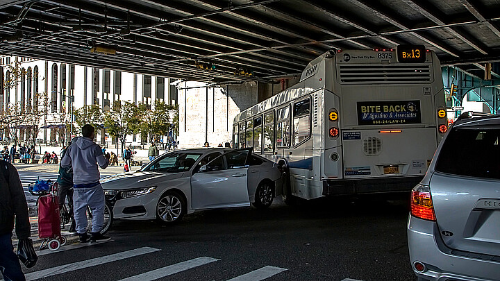 Stock photo of a car accident involving a NYC MTA bus in the Bronx