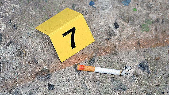 Escena crimen cigarrillo