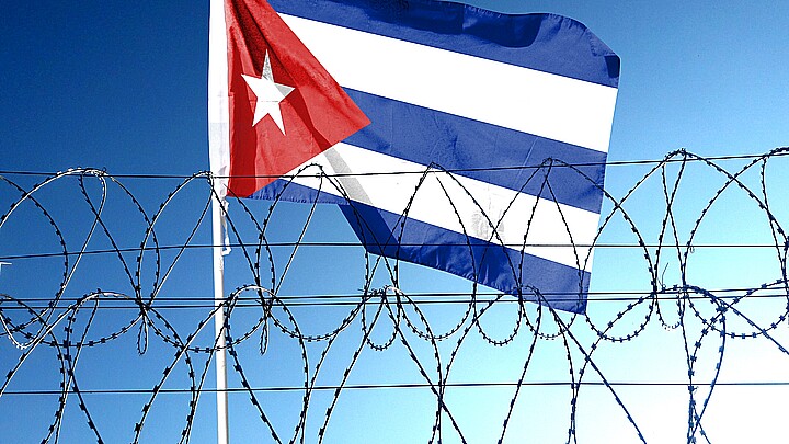Cuban flag and barb wire