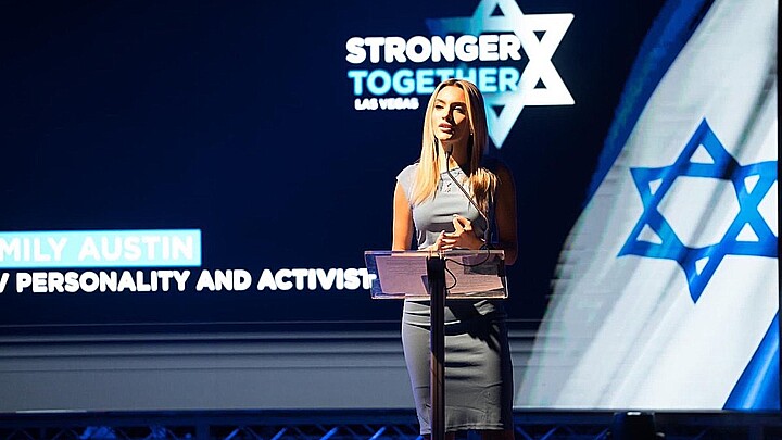 Emily Austin speaking at Stronger Together Las Vegas in November 2023
