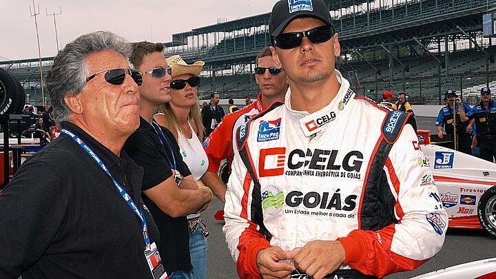 Racing legend Mario Andretti (left) and driver Jaime Camara check the weather before an Indy Pro Series event at Indianapolis Motor Speedway