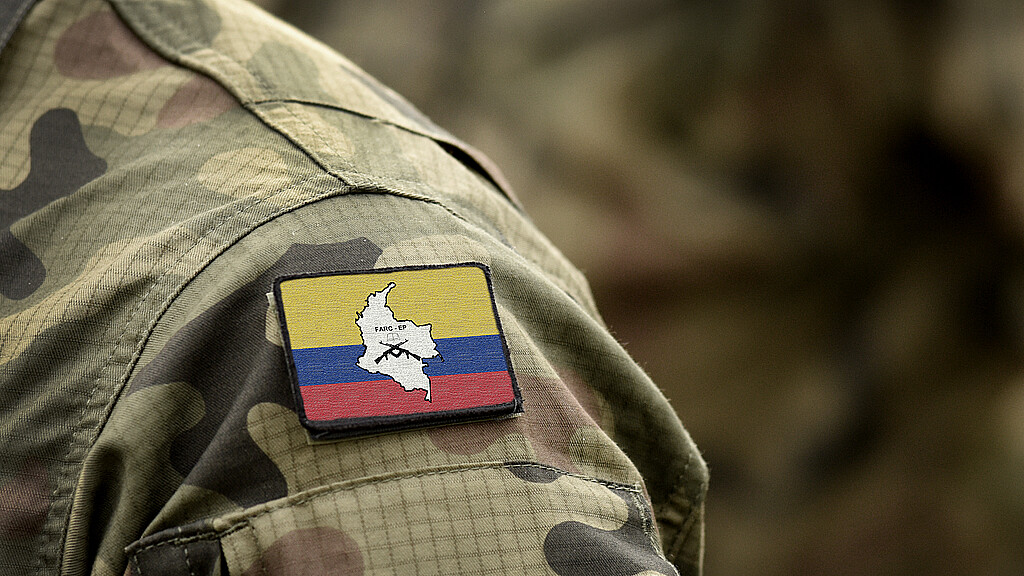 Flag of Revolutionary Armed Forces of Colombia (FARC) on military uniform