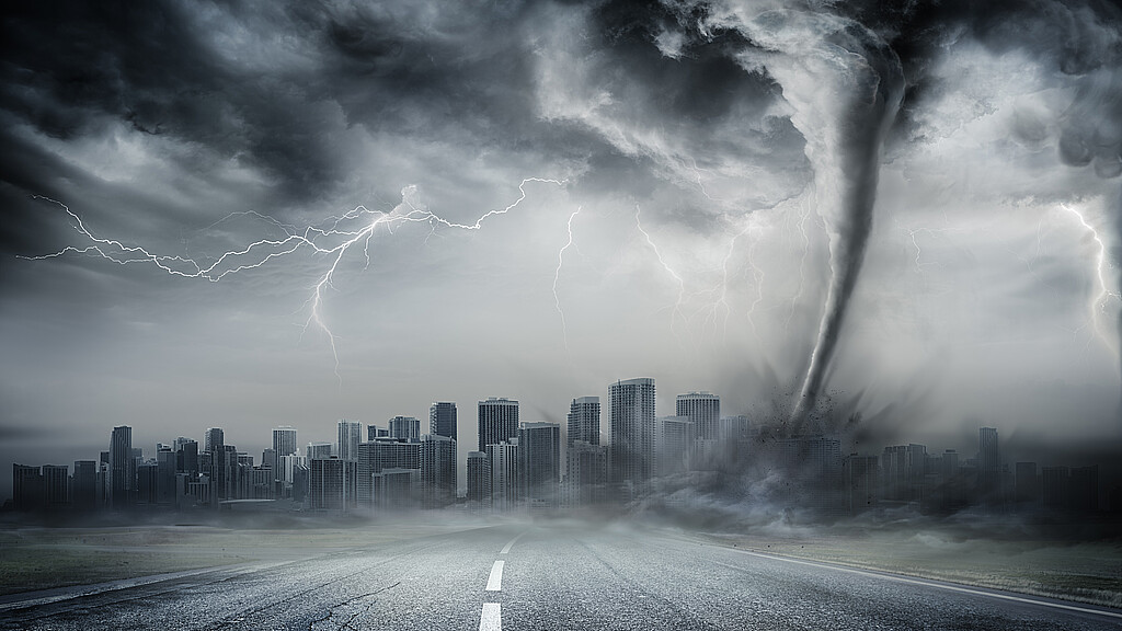 Stock photo image of tornado with city in background