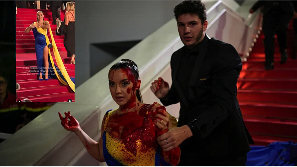 Influencer vestida con los colores de Ucrania se "cuela" en la alfombra roja de Cannes y se cubre con sangre falsa