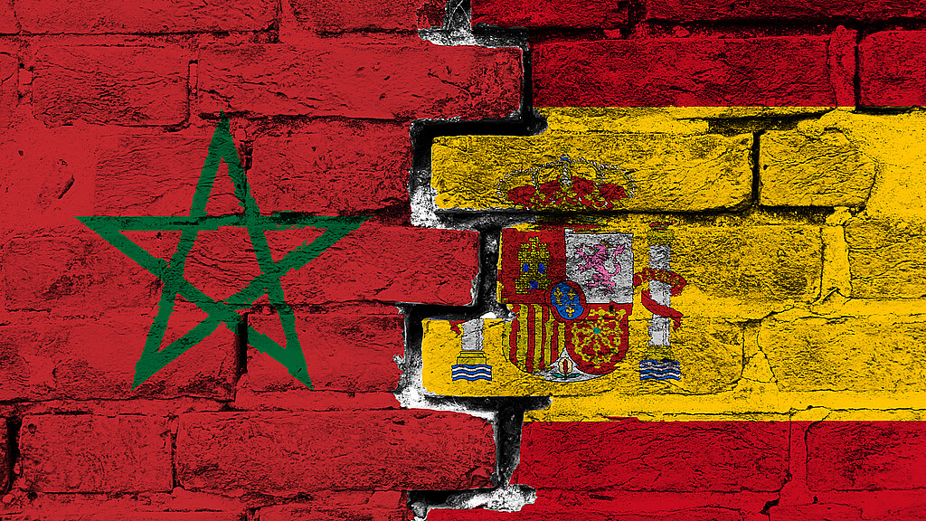 Moroccan and Spanish flags merging