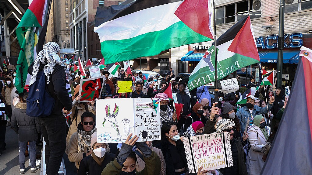 Pro-Palestinian protestors chant 