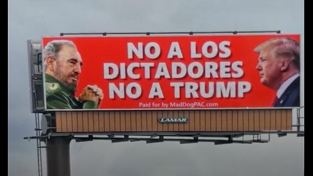 Valla publicitaria que compara a Donald Trump con Fidel Castro