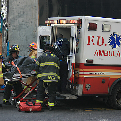 Individual loaded into ambulance in NYC
