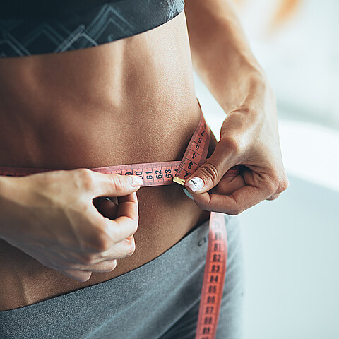 Mujer perdiendo peso