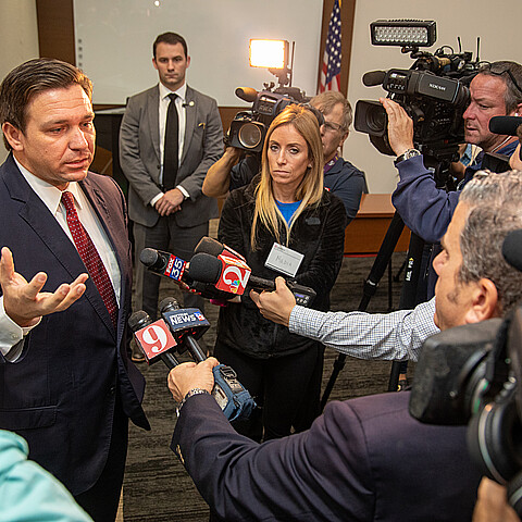 Florida Gov. Ron DeSantis answering questions from press