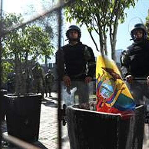 Ecuador military stands outside National Assembly