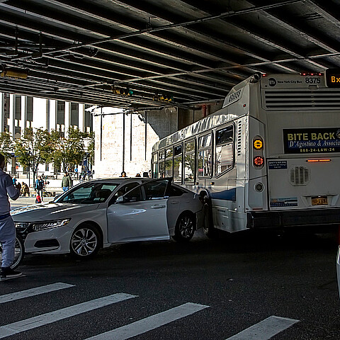 Stock photo of a car accident involving a NYC MTA bus in the Bronx