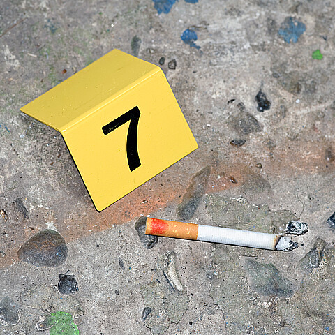 Escena crimen cigarrillo