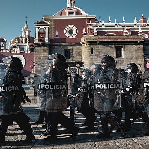Mexican police officers prepare to patrol in the City of Puebla
