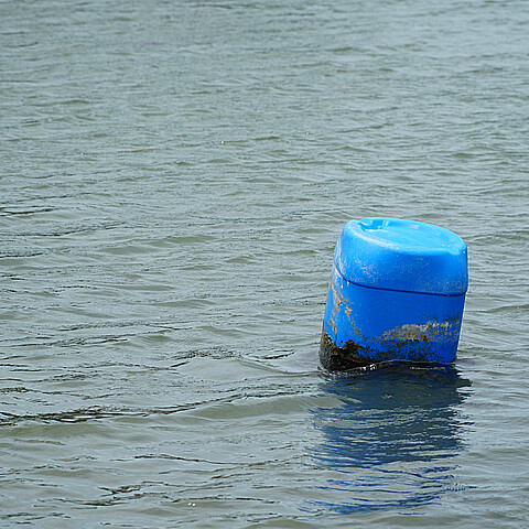 Barrel floating in water
