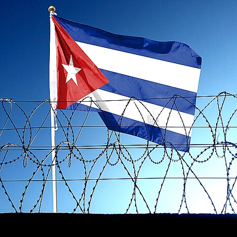 Cuban flag and barb wire