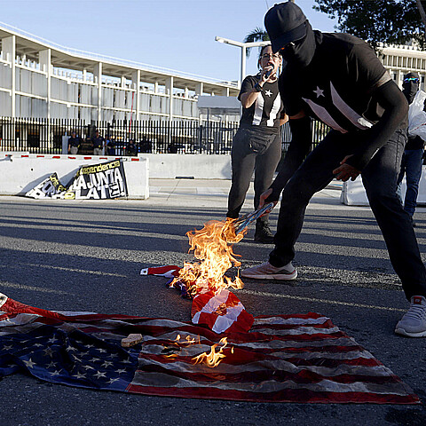  Individuals take part in a demonstration in front of the Federal Court today in San Juan, Puerto Rico.