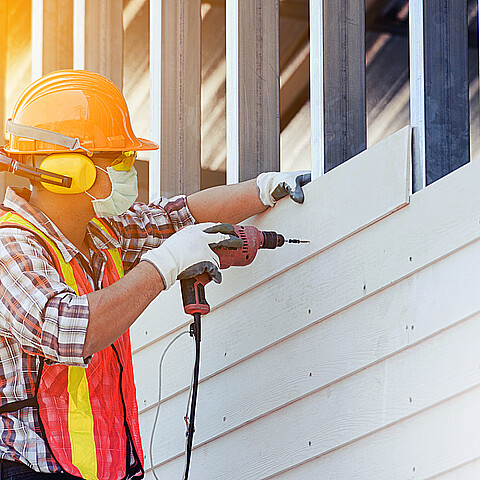 Stock photo of construction worker on new home development