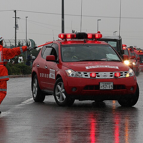 A scene from a disaster prevention drill that assumes a major earthquake held in heavy rain in Tokushima Japan in October 2011