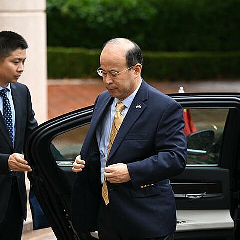 China sentences a Chinese-Australian writer and activist to a suspended death penalty.