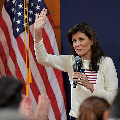 Former U.N. Ambassador Nikki Haley waves to the crowd at a campaign rally during the New Hampshire presidential primary.