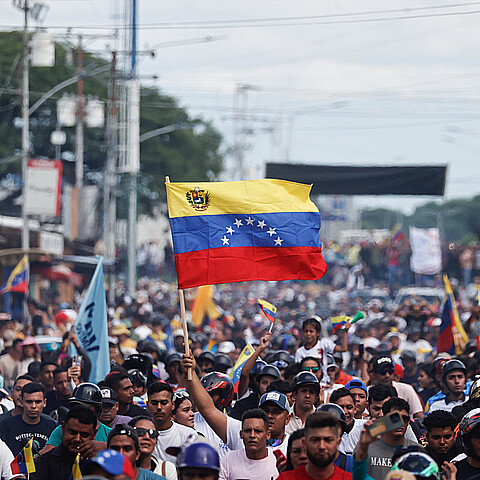 Supporters of the Venezuelan opposition leader María Corina Machado, participate this Wednesday in a presidential campaign tour in Guanare, Portuguesa state 