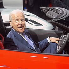 Joe Biden sits in a Corvette at the North American International Auto Show industry preview at Cobo Hall on January 16, 2014 in Detroit, Michigan