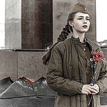 Stock image of pretty young girl in a Soviet military uniform