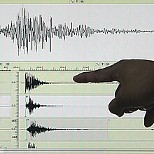 Archive image of a seismograph showing a recorded earthquake