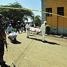 Forensic teams removes bodies from Honduran prison 