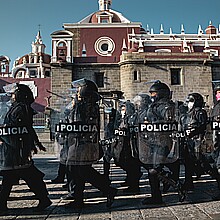 Mexican police officers prepare to patrol in the City of Puebla