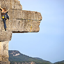 Woman free climbing 