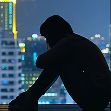 Stock photo of woman facing depression and isolation