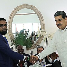 Guyanese President Irfan Ali and Venezuelan dictator Nicolas Maduro shake hands in agreement over contested region